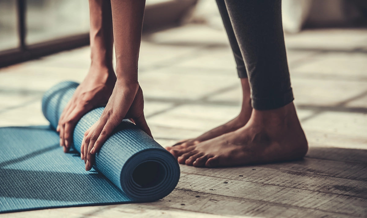 Opgerolde yoga mat 